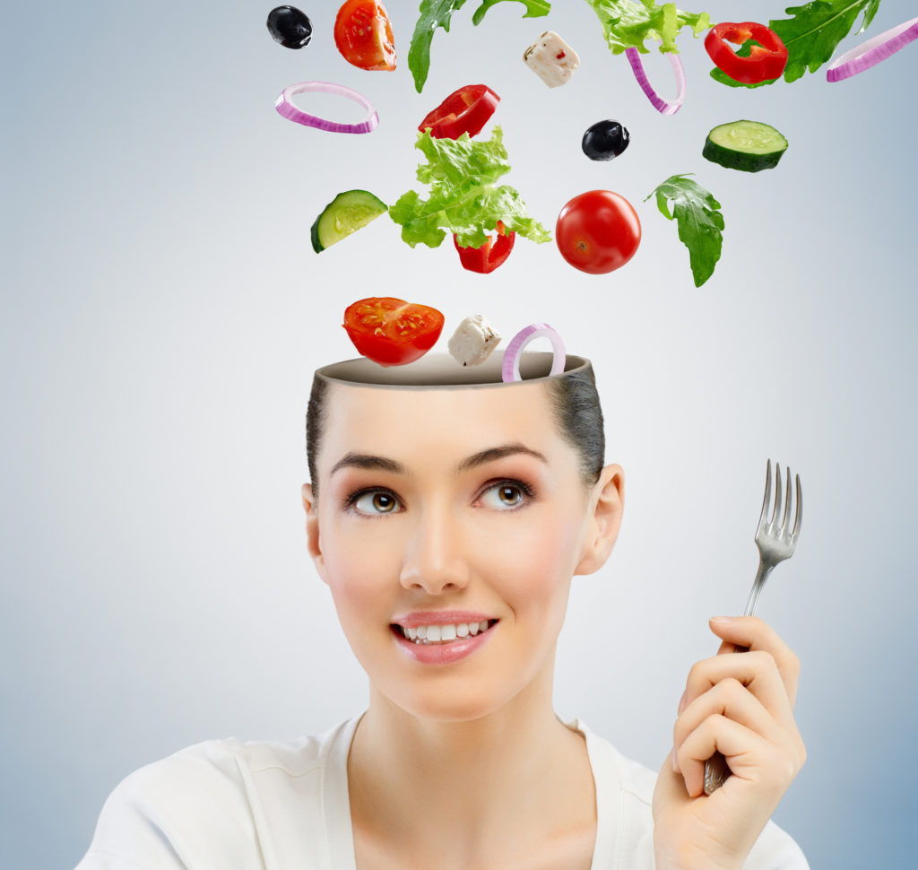 A beautiful girl eating healthy food